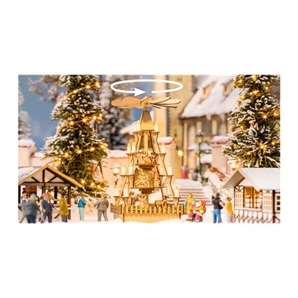 NOCH 66413 micro‑motion Christmas market pyramid displayed in a festive scene with decorative background